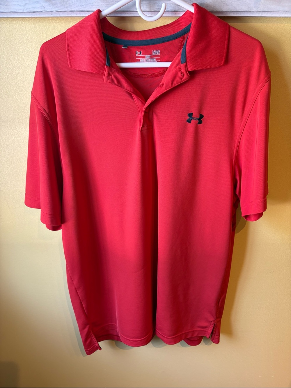 Under Armour orange Polo with Black Logo